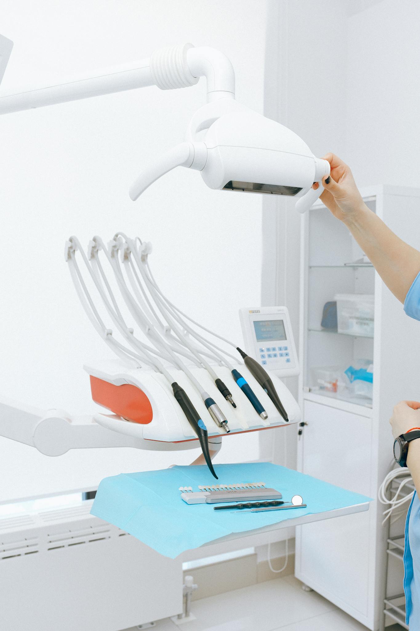 Modern dental equipment on table in light room in clinic